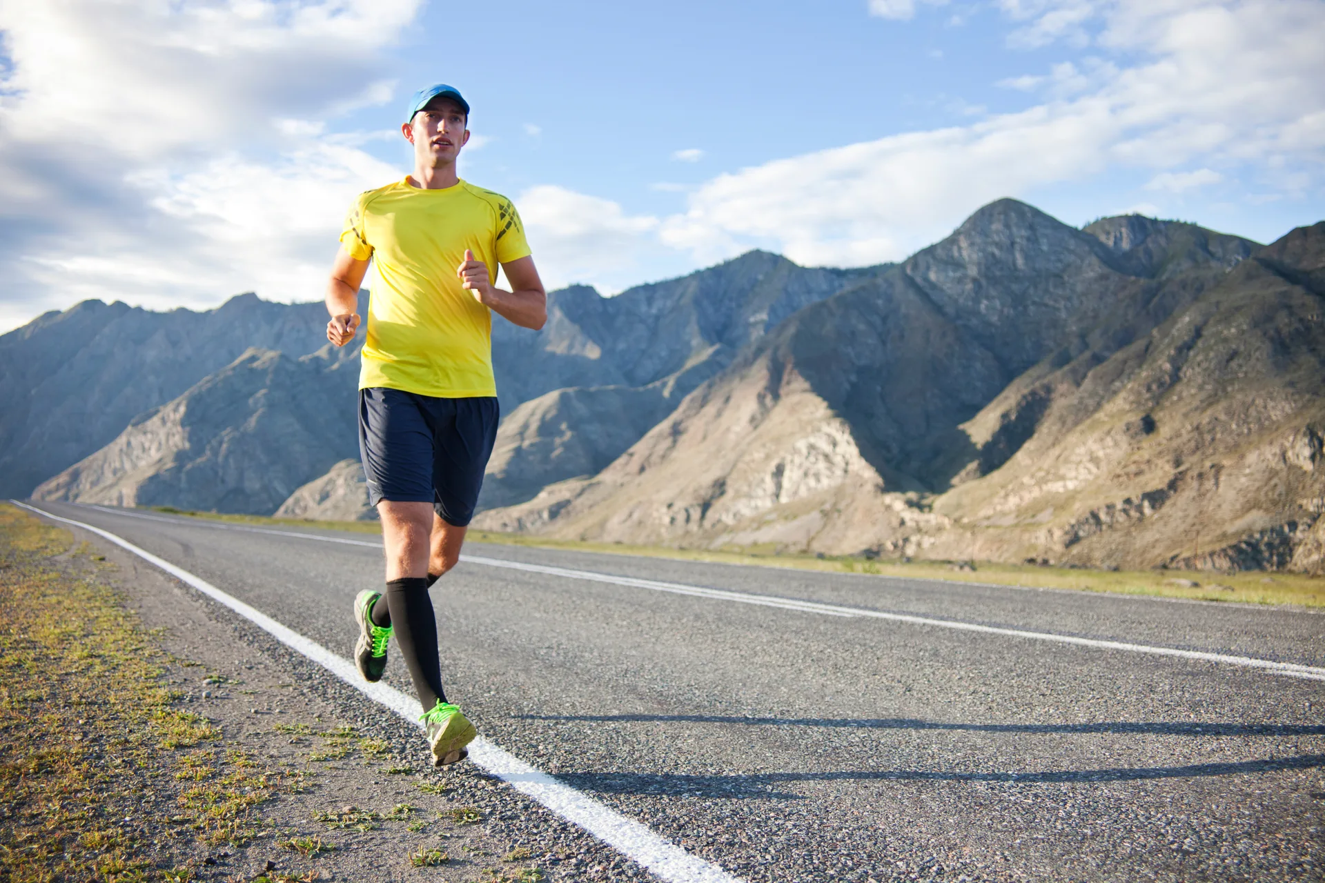 Runner on mountain road